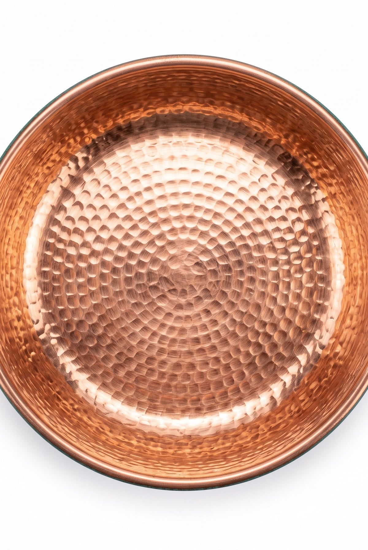 Overhead view of the hammered copper interior of the pedicure bowl