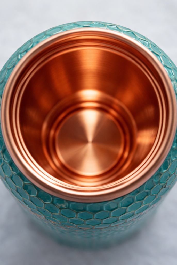 950ml pure copper bottle featuring detailed floral embossing and green color