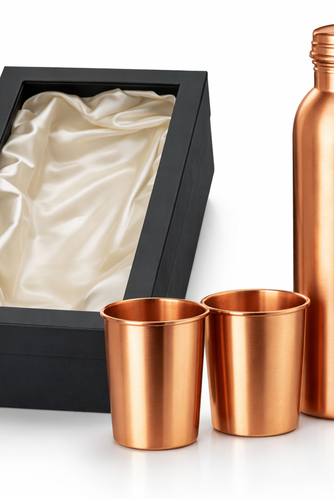 Close-up of a high-quality plain copper water set with a soft matt texture.