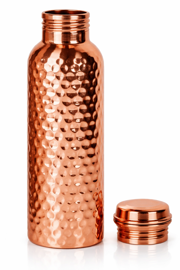 Elegant hand-hammered copper water bottle displayed for healthy hydration.