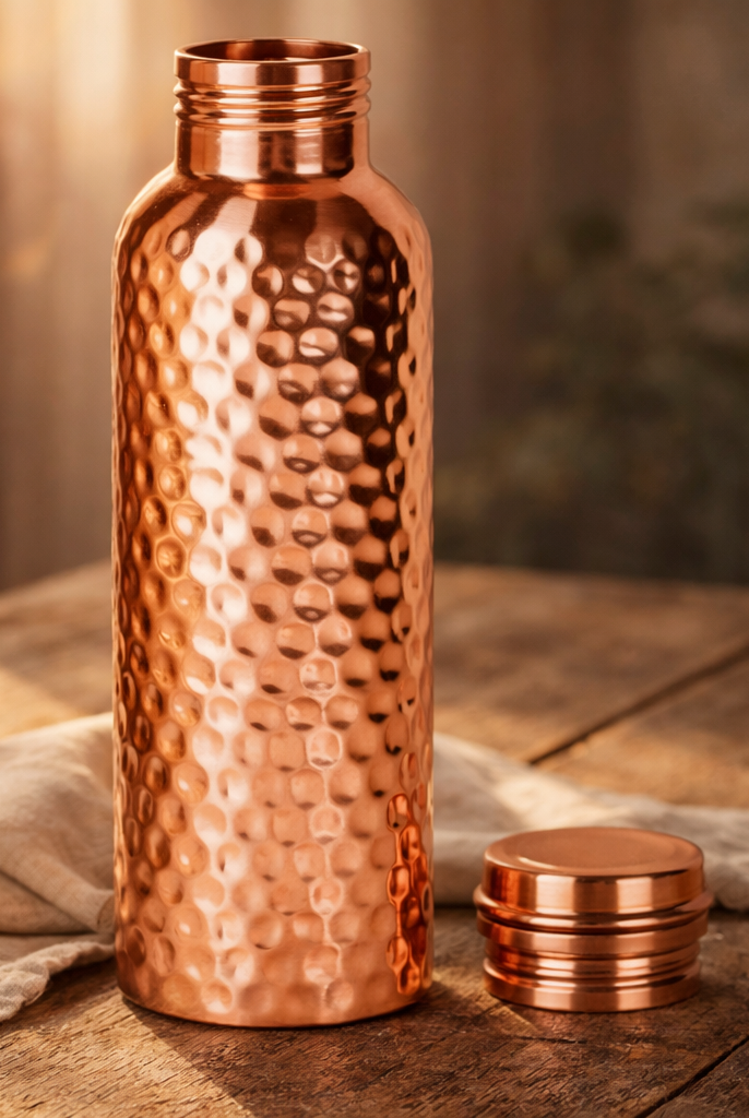 950ml hand-hammered copper water bottle with a leak-proof copper cap.