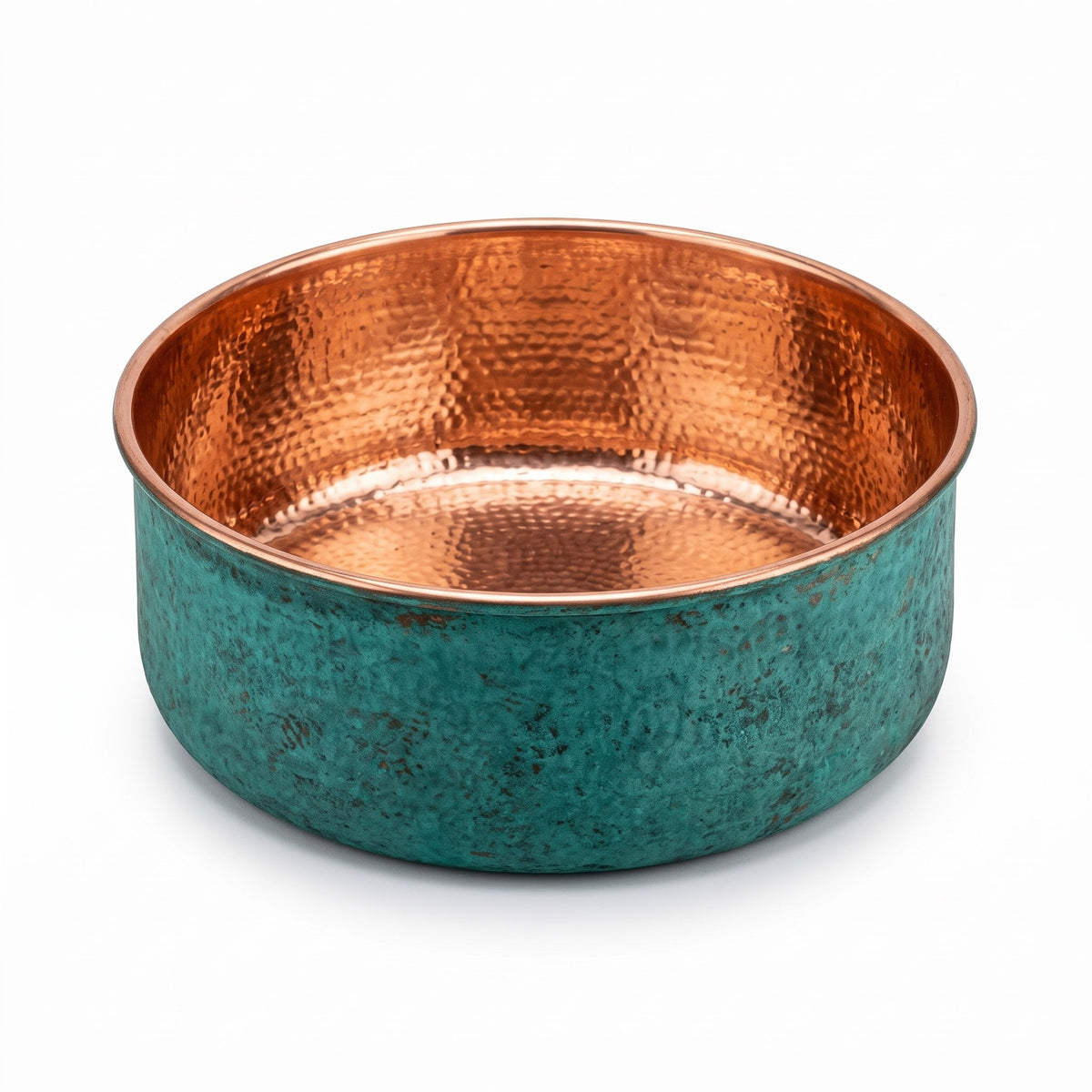 Hand hammered copper pedicure bowl with green patina outside and polished copper inside