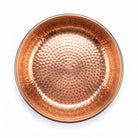 Overhead view of the hammered copper interior of the pedicure bowl