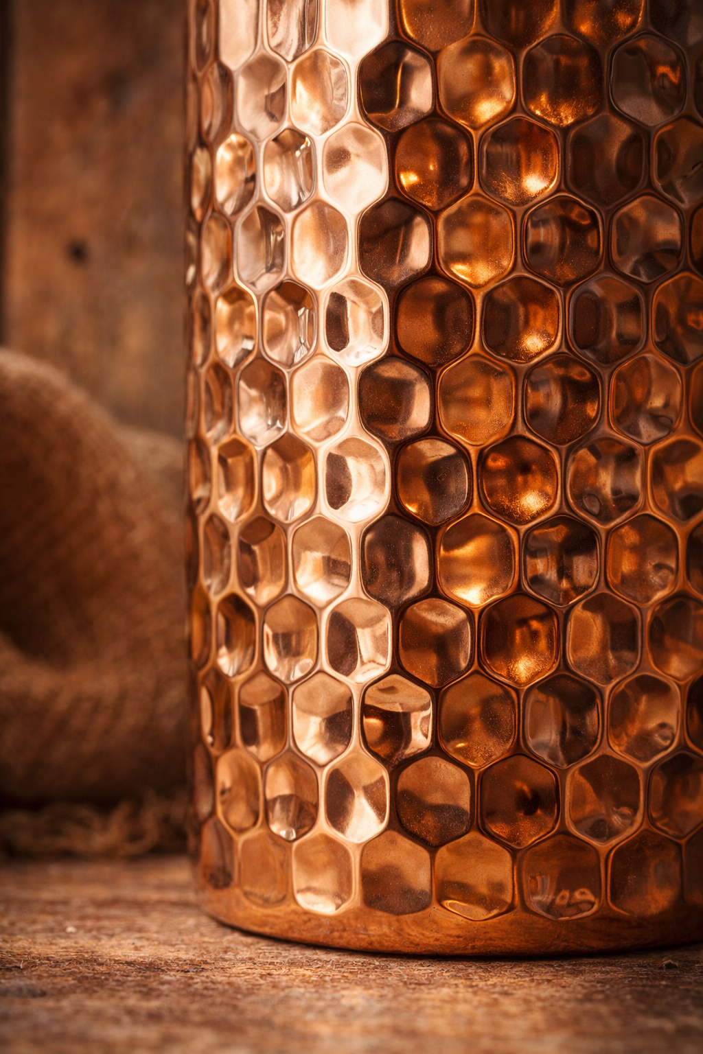 Overhead view of hammered copper jug and lid