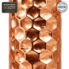 Embossed copper water bottle with shiny polish, independently lab tested, no heavy metals detected