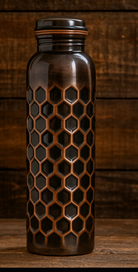 Elegant antique finish embossed copper bottle for healthy hydration.